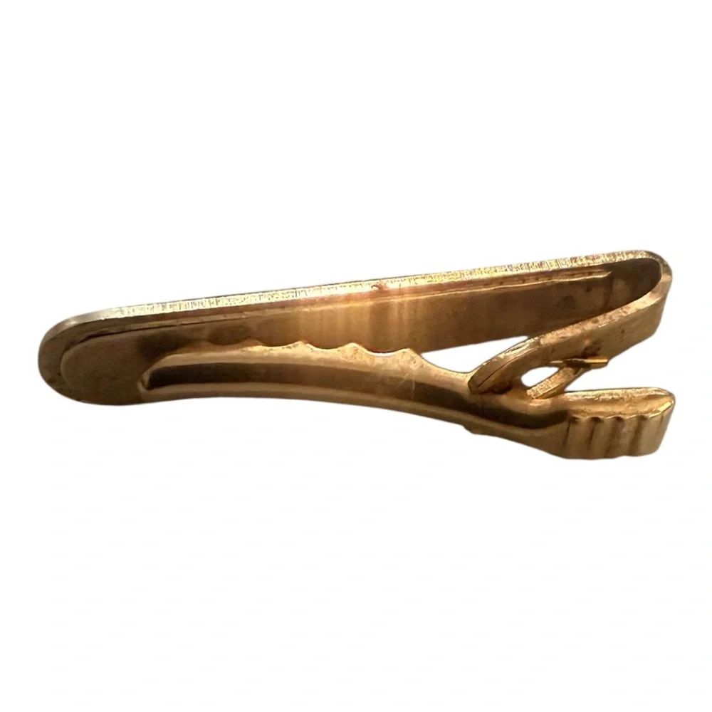 1970’s Tie Clip in Gold with a Carved Blue Design, 1.4”‎ Long